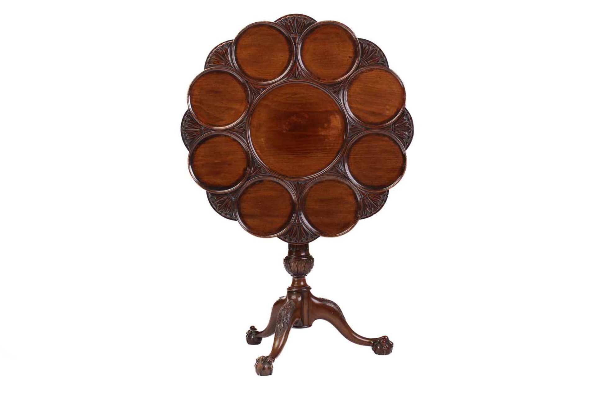 A George III style mahogany revolving supper table, 20th century (but a faithful copy), the circular