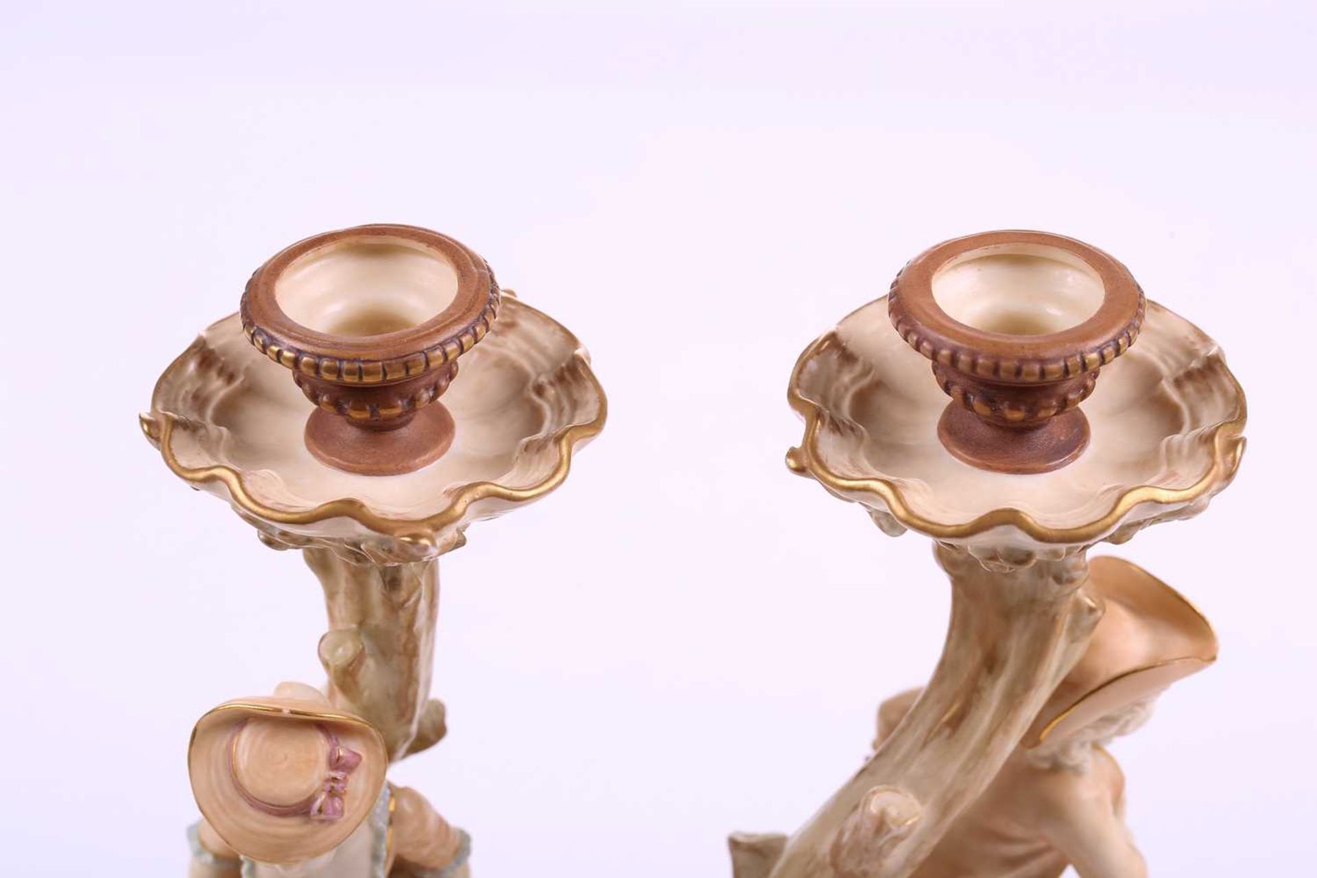 A pair of Royal Worcester figural candlesticks, modelled by James Hadley, as a boy and girl in - Bild 6 aus 8