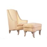 A "Hollywood Regency" style ivory faux chamois upholstered armchair and ottoman with angular