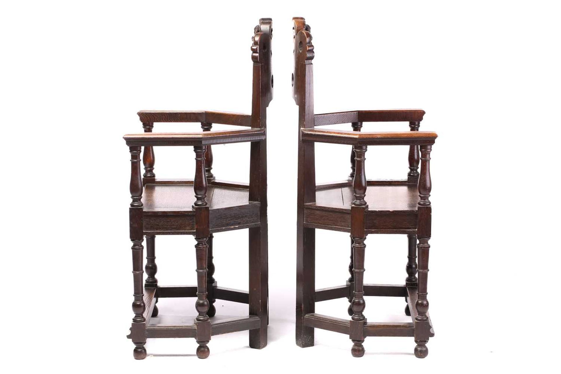 A pair of French carved oak caquetoire armchairs, 19th/20th century, the curved backs carved and - Image 5 of 11