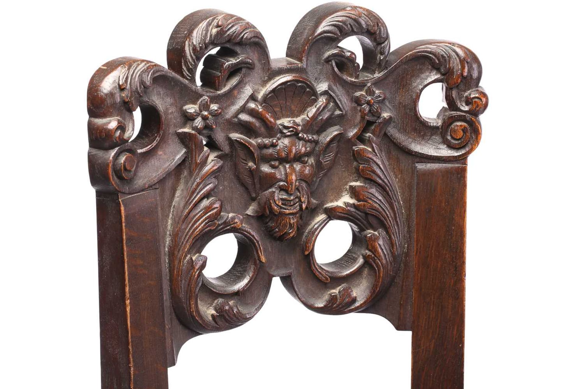 A pair of French carved oak caquetoire armchairs, 19th/20th century, the curved backs carved and - Image 2 of 11