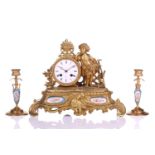 A Henry Marc of Paris 8-day gilt mantel clock, late 19th century, with figural surmount emblematic