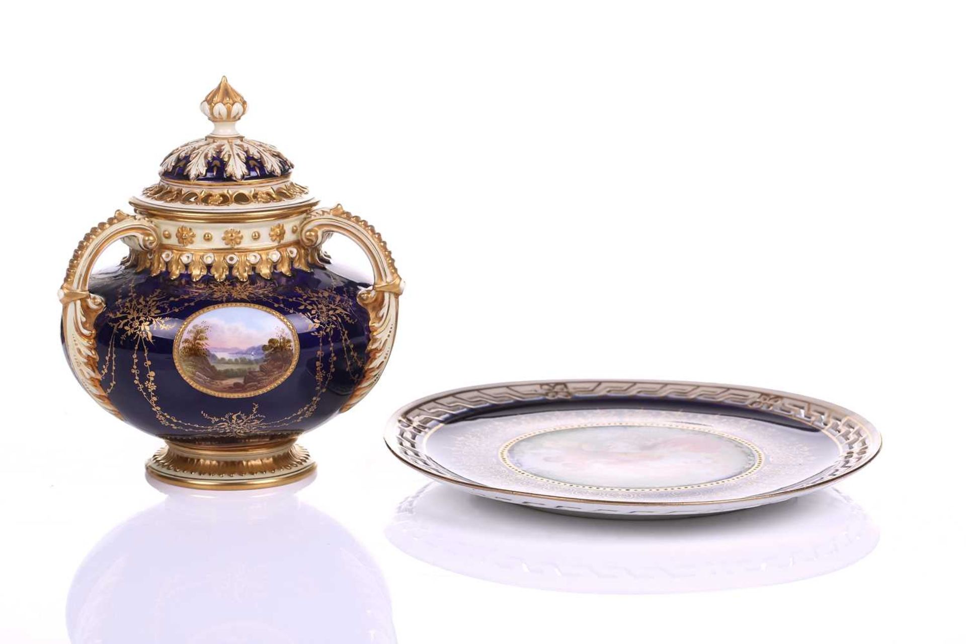 An early 20th century Coalport Bleu de Roi three-handled potpourri and cover and inner lid, The