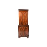 A Reprodux, George III style mahogany two section free standing corner drinks cabinet with small