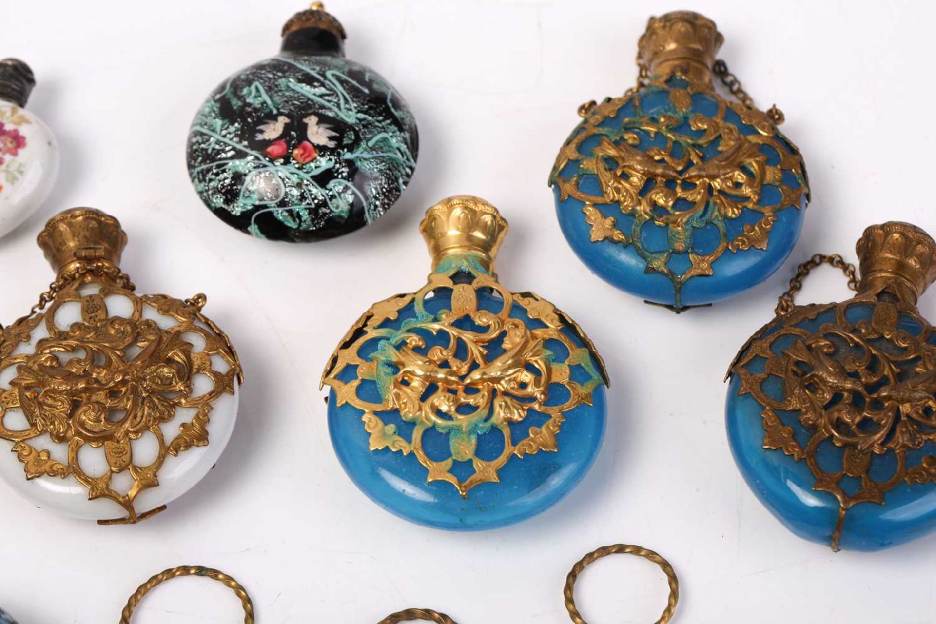 A good collection of miniature Continental ceramic and Murano glass scent bottles, many with gilt - Image 4 of 19
