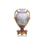 A French porcelain ormolu mounted oval two-handled vase, c1900, painted in the round with Italianate