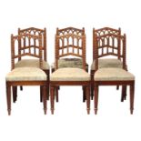 A matched set of six William IV oak Gothic revival side chairs possibly by Gillows of Lancaster