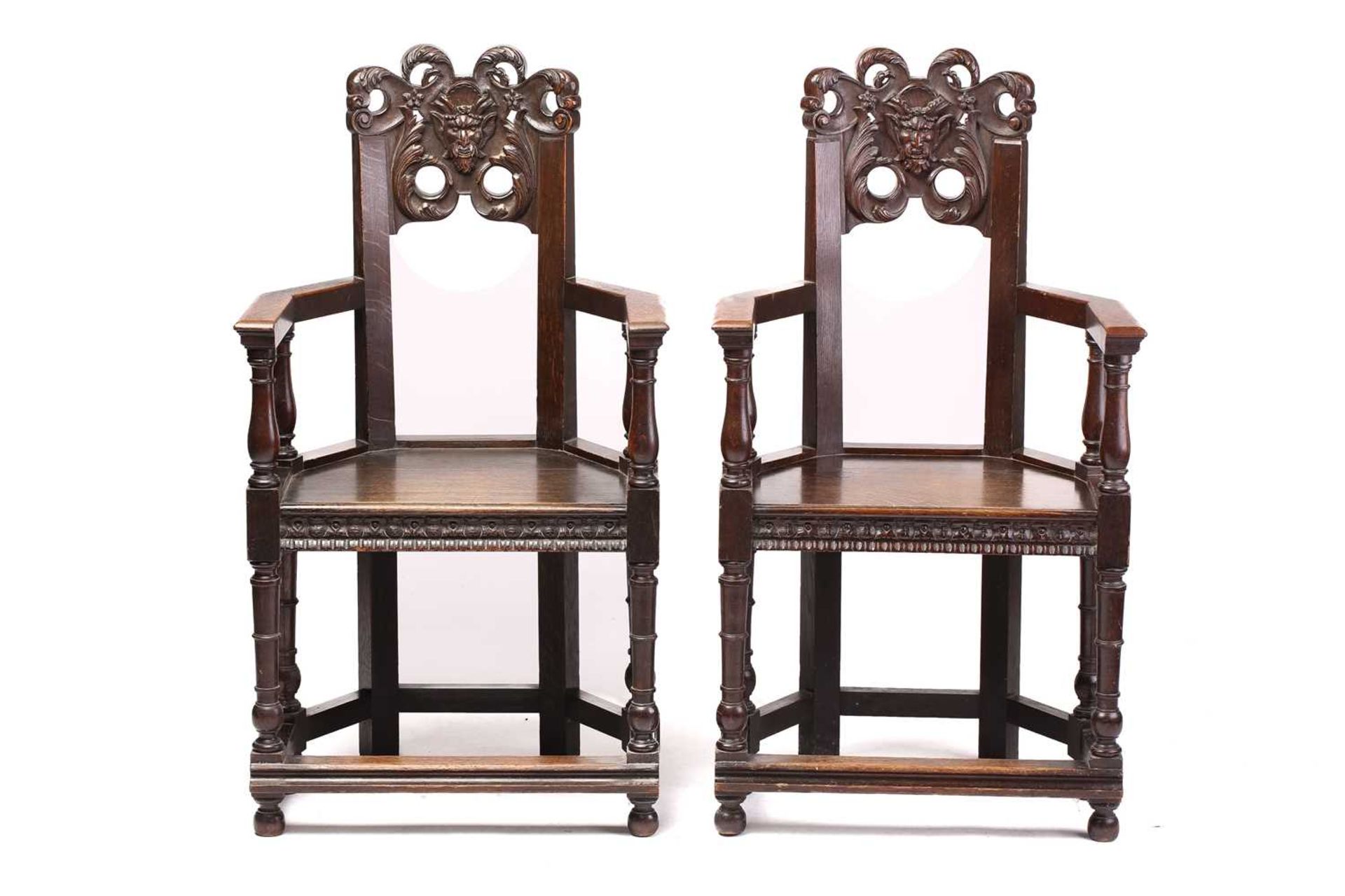 A pair of French carved oak caquetoire armchairs, 19th/20th century, the curved backs carved and - Image 9 of 11