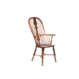 A 19th century Nottinghamshire yew wood and ash high back Windsor chair, with shaped and pierced