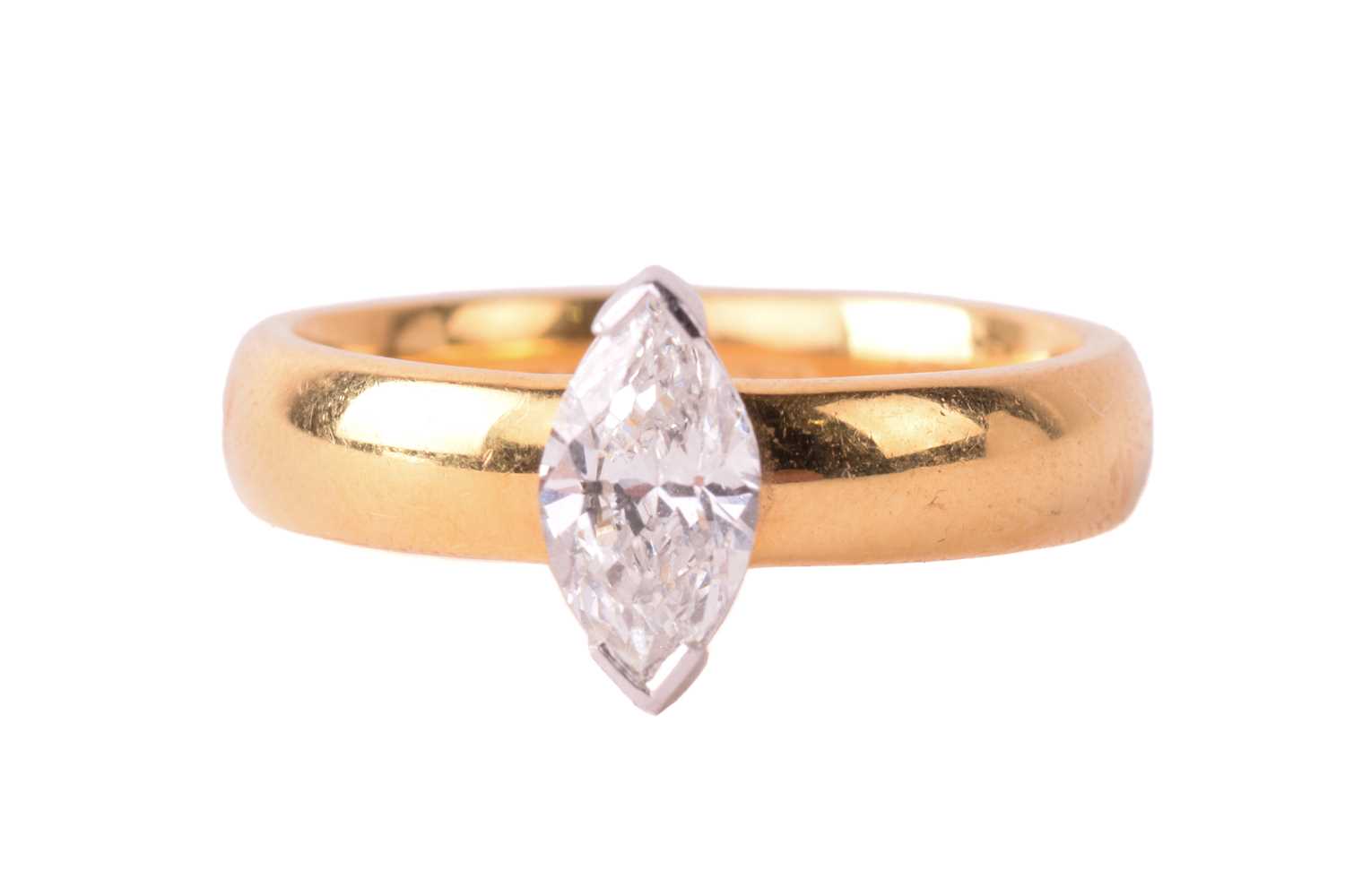 A solitaire diamond ring, set with a marquise cut diamond with an estimated weight of 0.70ct, the