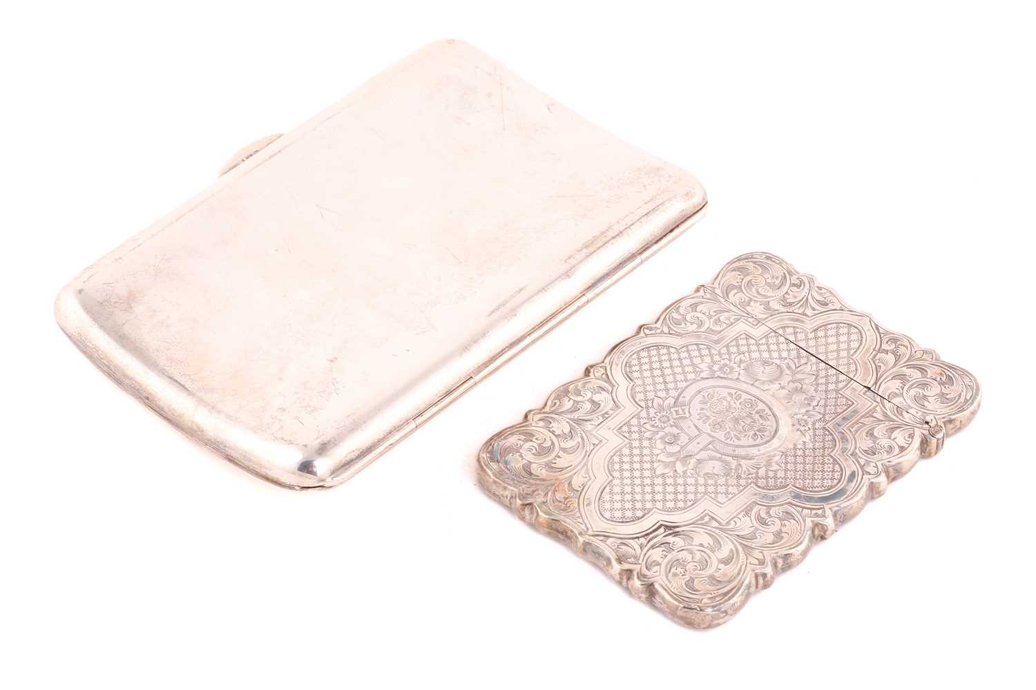 An Edward VII silver cigarette case, Chester 1900 by Colen Hewer Cheshire, with a gold-coloured - Image 2 of 9