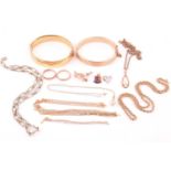 A collection of yellow metal jewellery, including a chain with hallmarks for 9ct gold, three