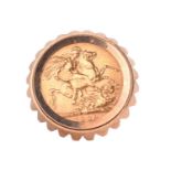 An Edward VII 1908 full sovereign ring mounted in 9ct yellow gold, set in an openwork mount with