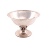 Georg Jensen - a footed dish with flared rim, after the design of 'Louvre Bowl', supported with