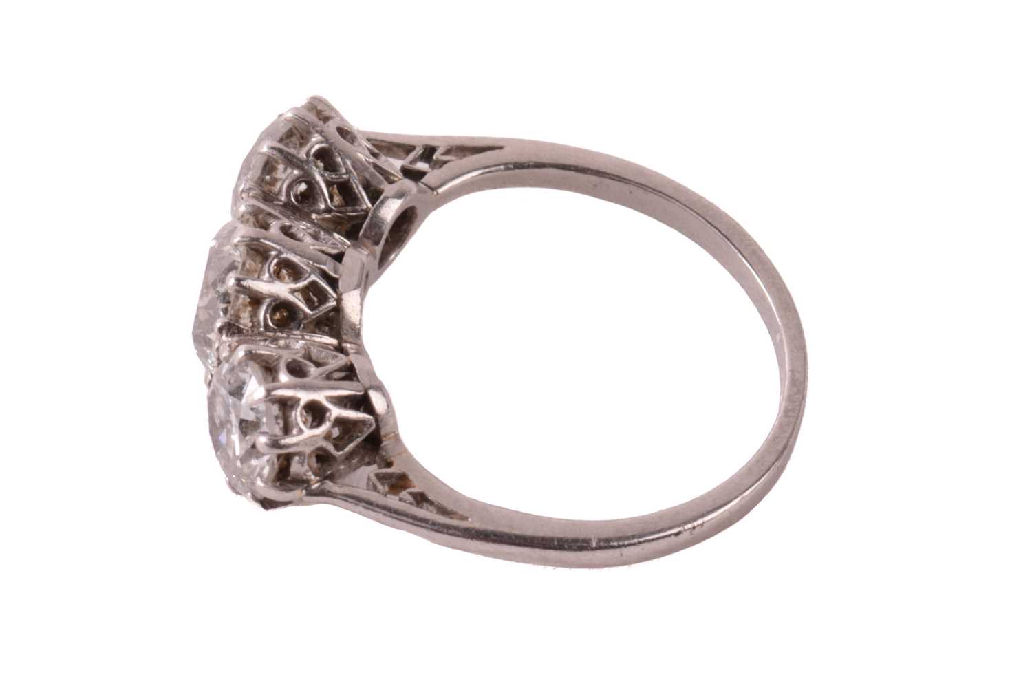 A three-stone diamond half-hoop ring, coronet-set with three graduated old-cut diamonds with an - Image 2 of 4