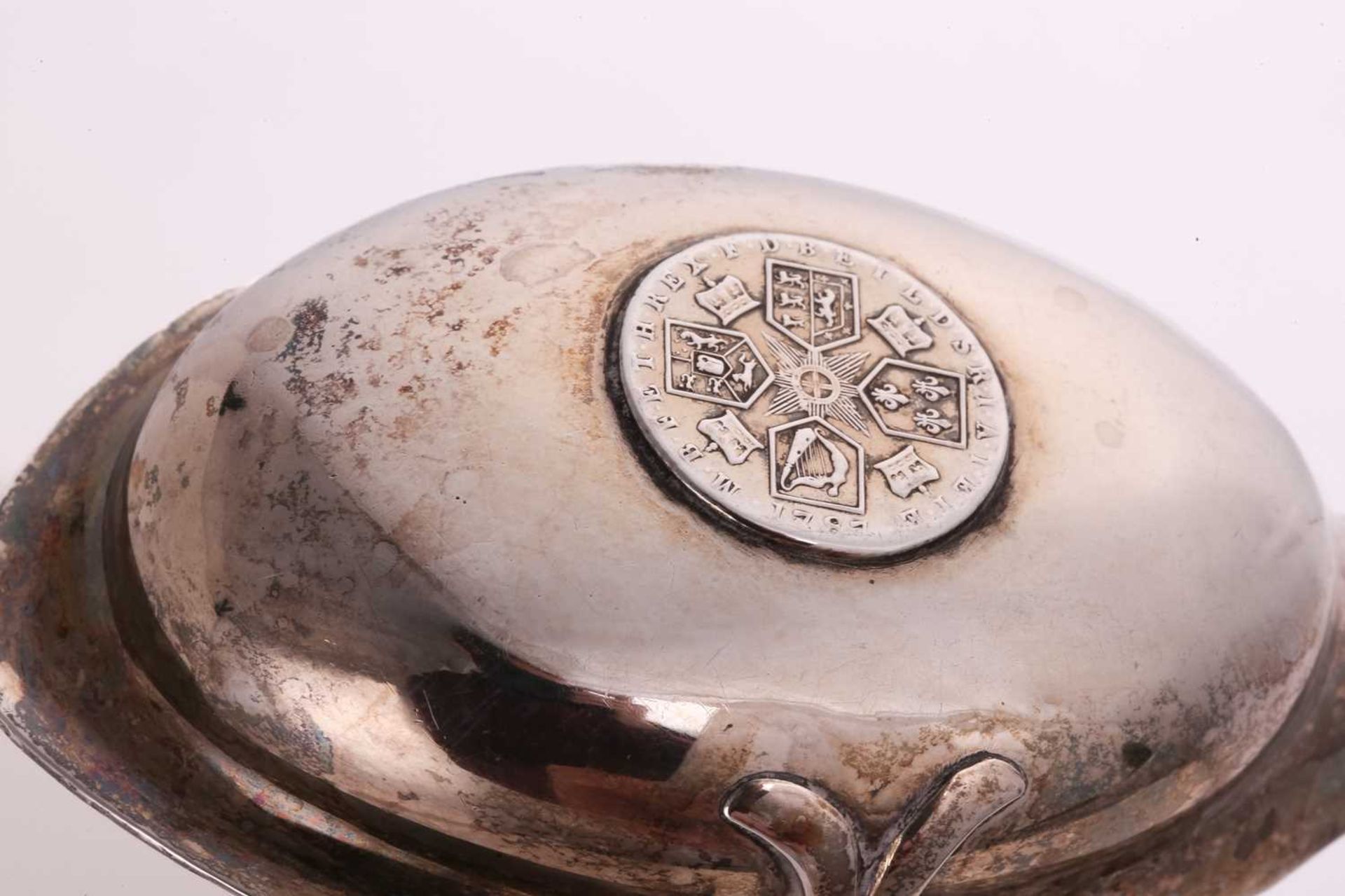 A George III white metal toddy ladle, the unassayed bowl with inset silver sixpence dated 1787, with - Image 4 of 5