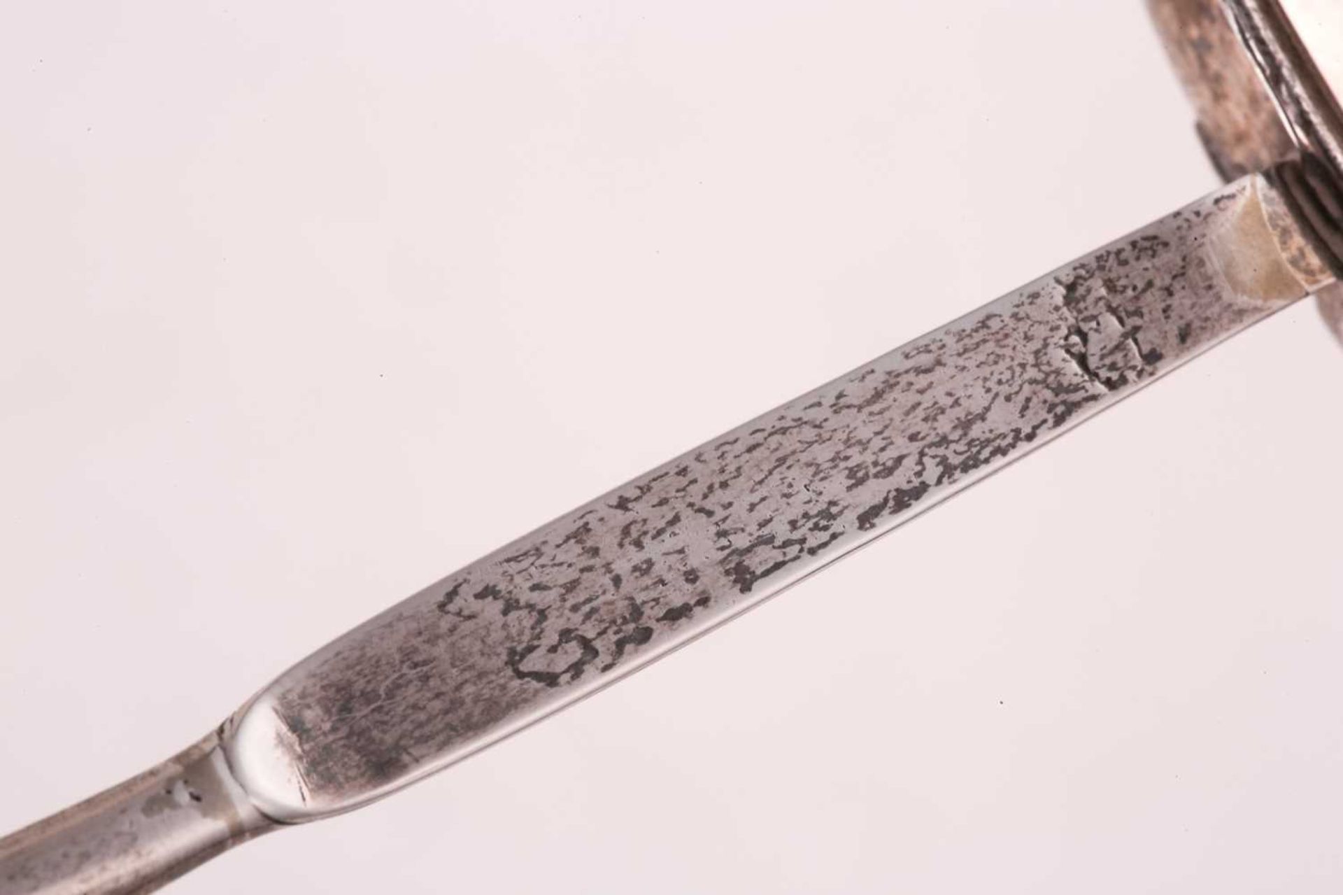 A George III white metal toddy ladle, the unassayed bowl with inset silver sixpence dated 1787, with - Image 5 of 5