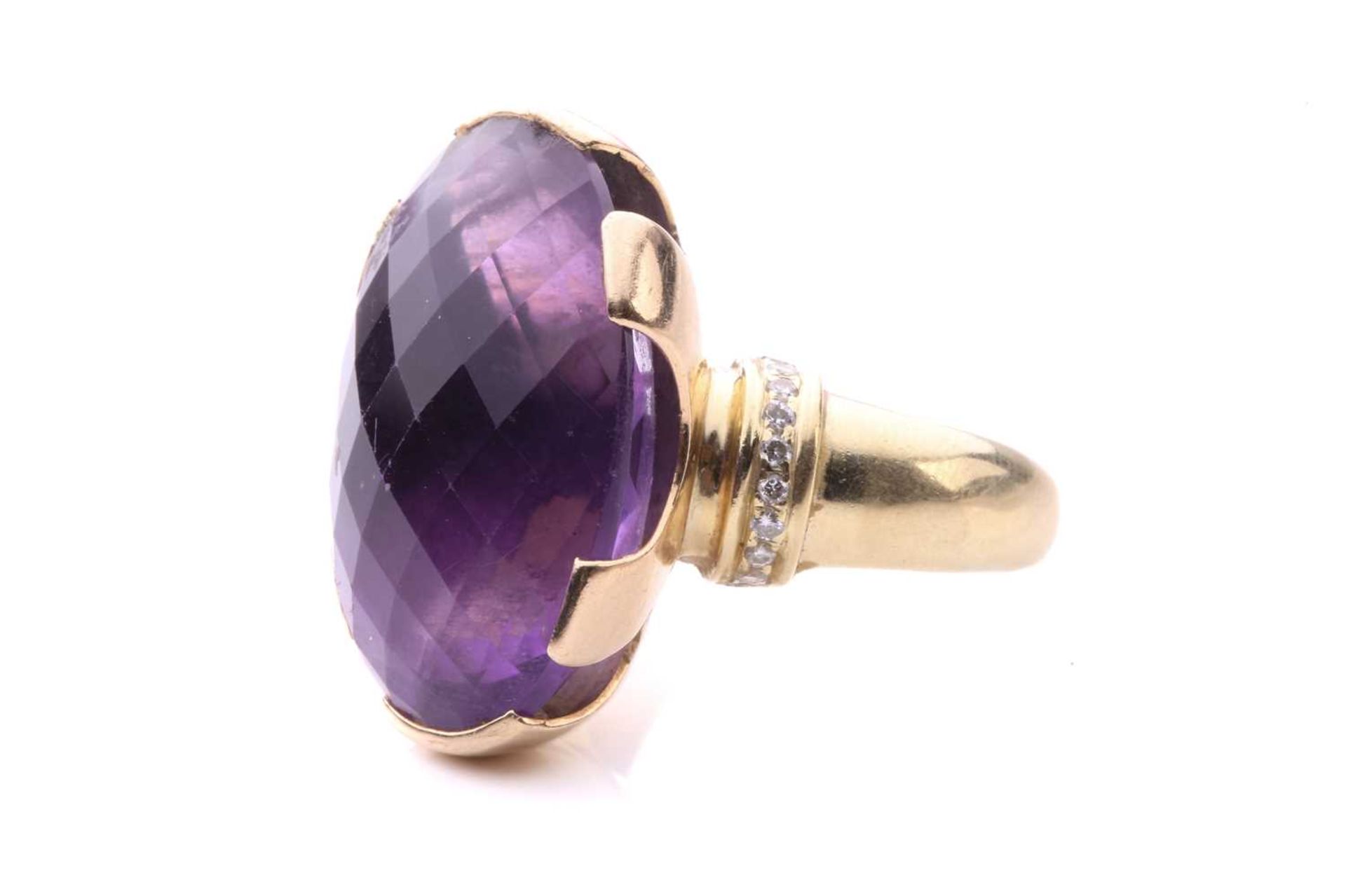 A large amethyst cocktail ring, set with an oval fancy cut amethyst of 25mm x 18mm x 14mm, each - Image 3 of 8