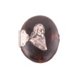 A George I tortoiseshell and silver mounted snuff box, no hallmarks, the oval hinged cover applied