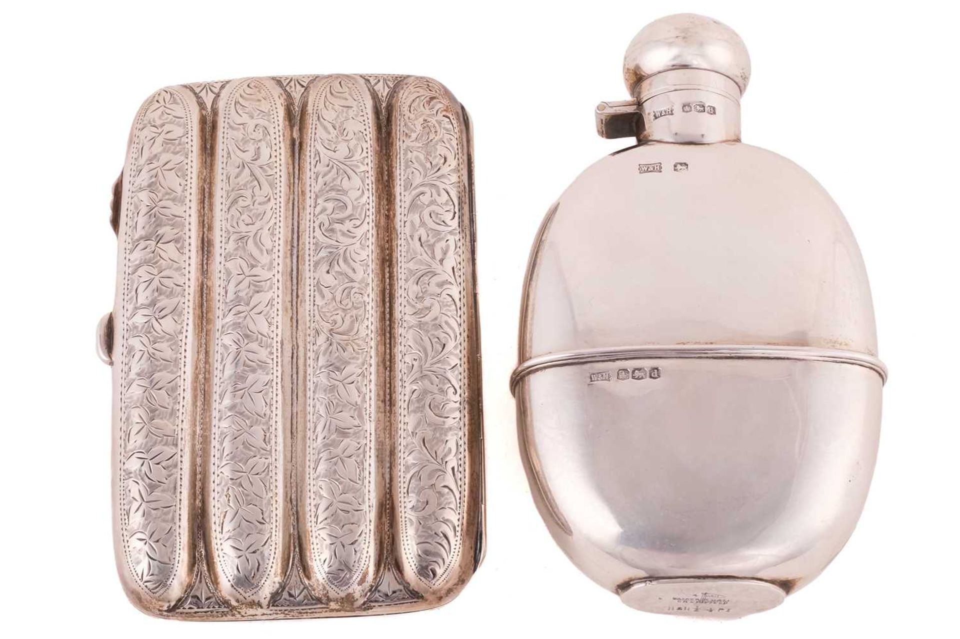 A silver hip flask and a silver cigar case, the oval hip flask by Walker and Hall, Sheffield 1920,