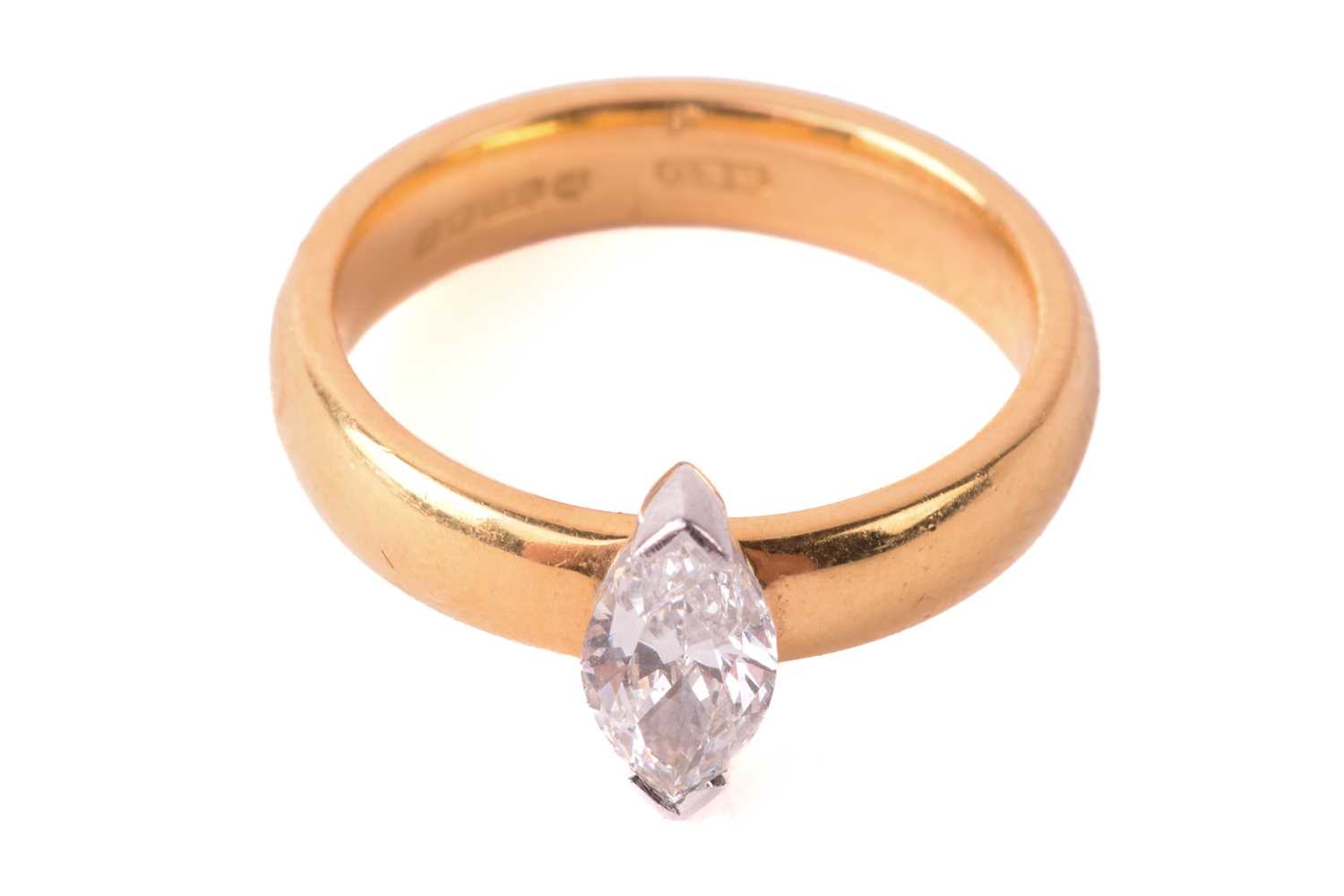 A solitaire diamond ring, set with a marquise cut diamond with an estimated weight of 0.70ct, the - Image 2 of 5