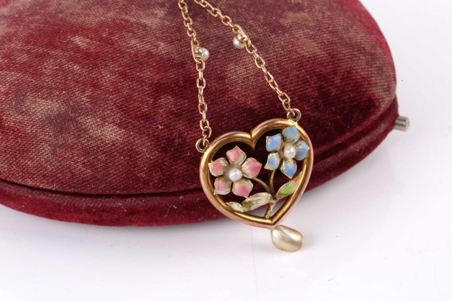 An Edwardian enamel and pearl floral pendant necklace designed as a heart with a spray of flowers in - Image 6 of 8