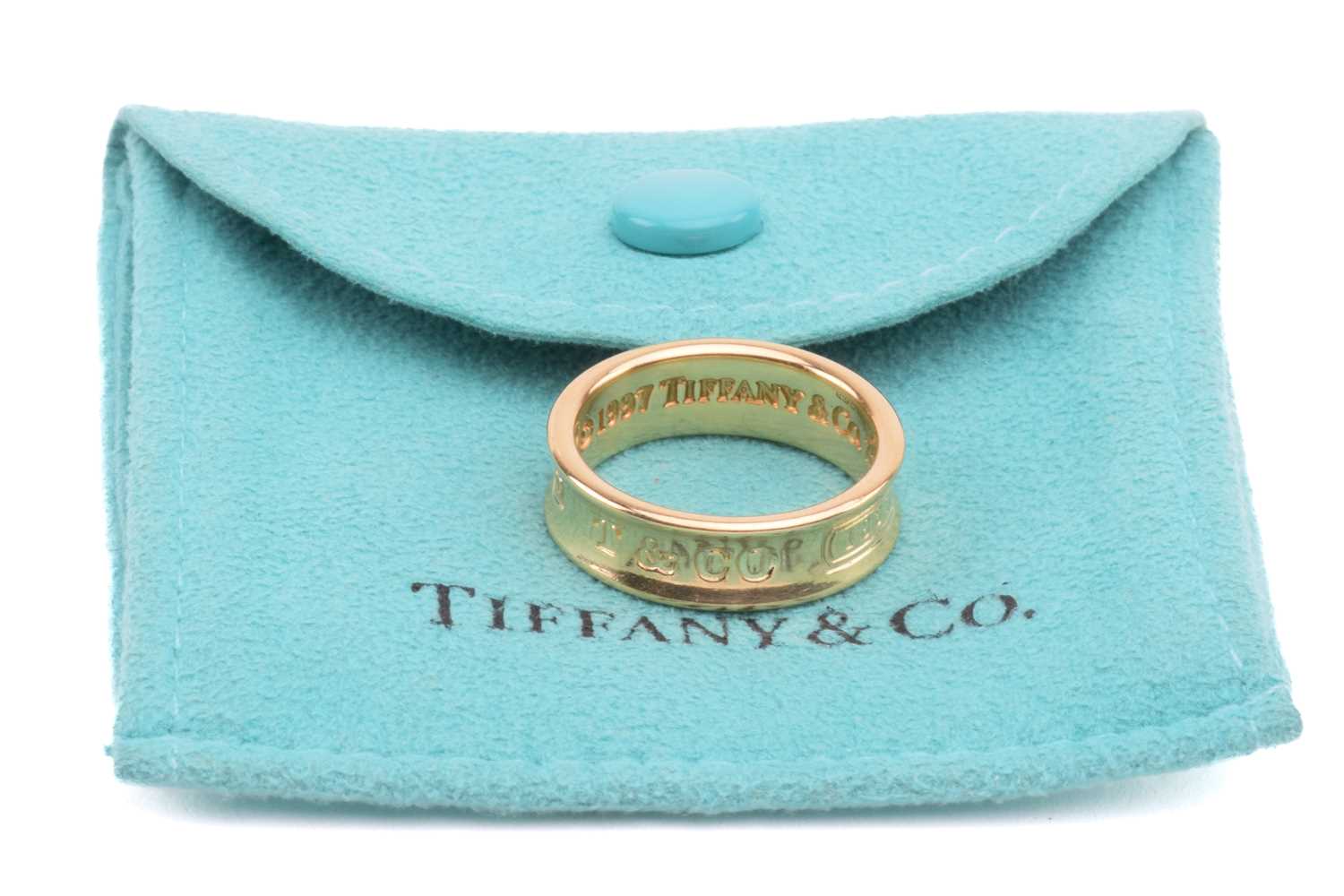 Tiffany & Co. - an 18ct yellow gold ring from the '1837' collection, the 6.1 mm wide concave band - Image 2 of 5