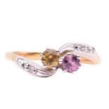 A gem-set toi et moi ring in 18ct gold, set with a circular-cut pink sapphire and yellow sapphire in