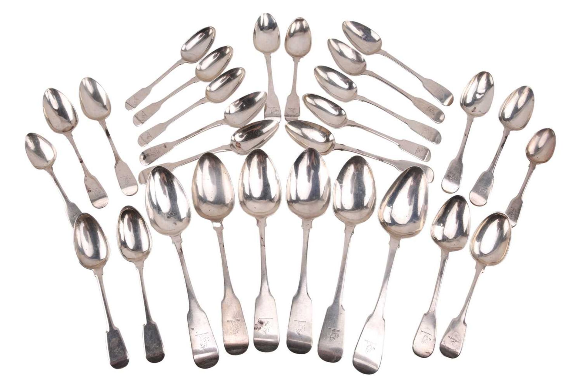 A quantity of crested silver spoons of fiddle pattern, with mixed date and makers; comprising: six