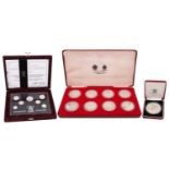 A cased set of eight proof silver encapsulated crown pieces, to commemorate Queen Elizabeth II