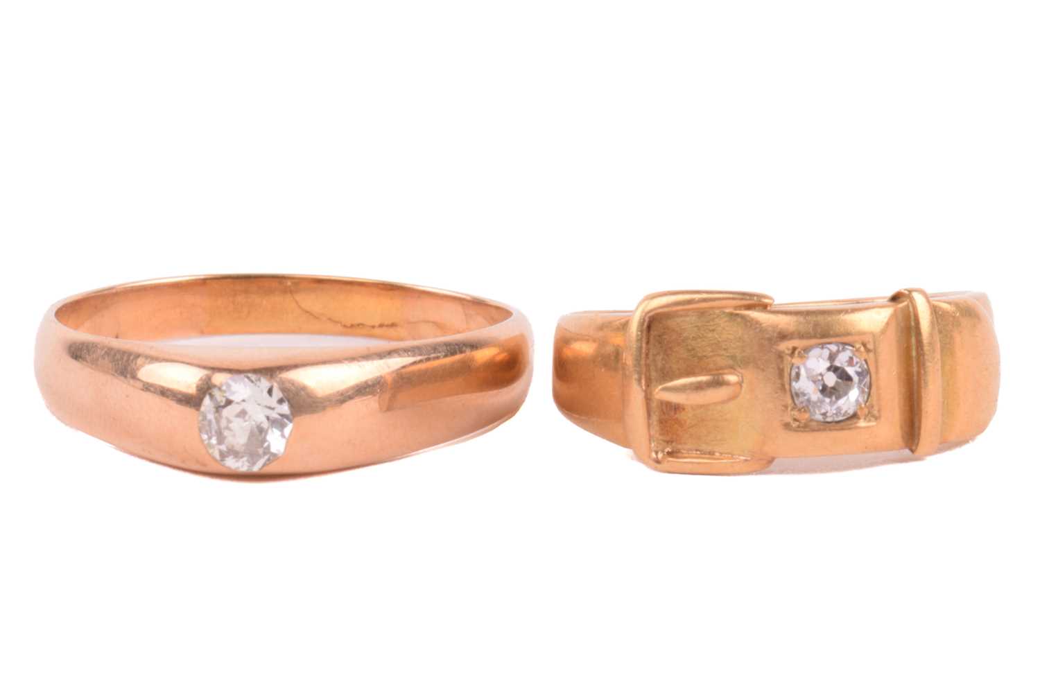 Two rings set with old-cut diamonds; comprising a gypsy ring, flush-set with an old-cut diamond of