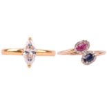 A synthetic ruby, synthetic sapphire and diamond cross over cluster ring, marked 375, size Q, and