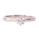A diamond solitaire ring, set with a round brilliant cut diamond with an estimated weight of 0.50ct,