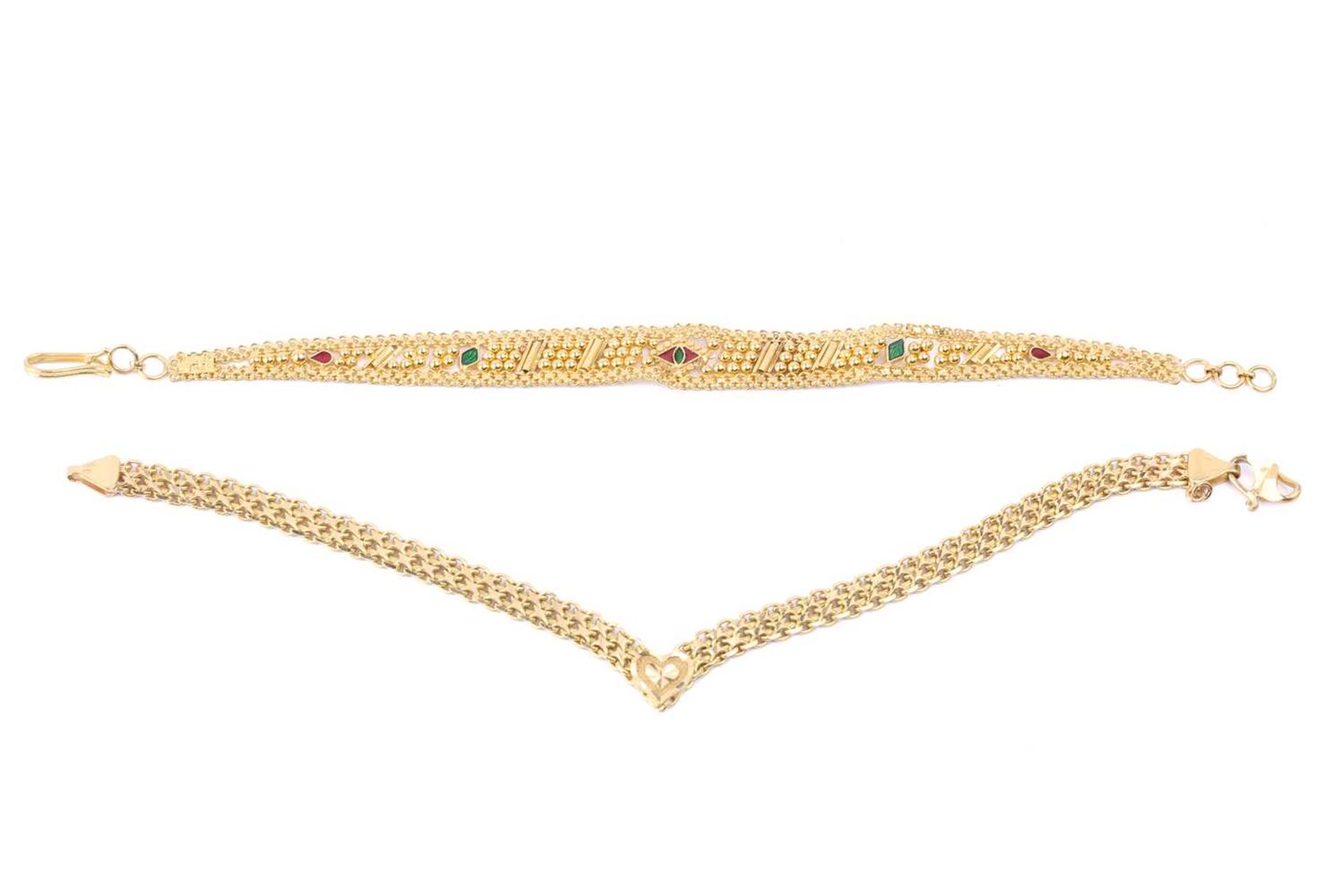 Two 22ct yellow gold bracelets; the first bracelet of chevron form, comprising a bismarck link chain