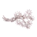 A diamond floral spray brooch, with an estimated total diamond weight of approximately 14.00cts,