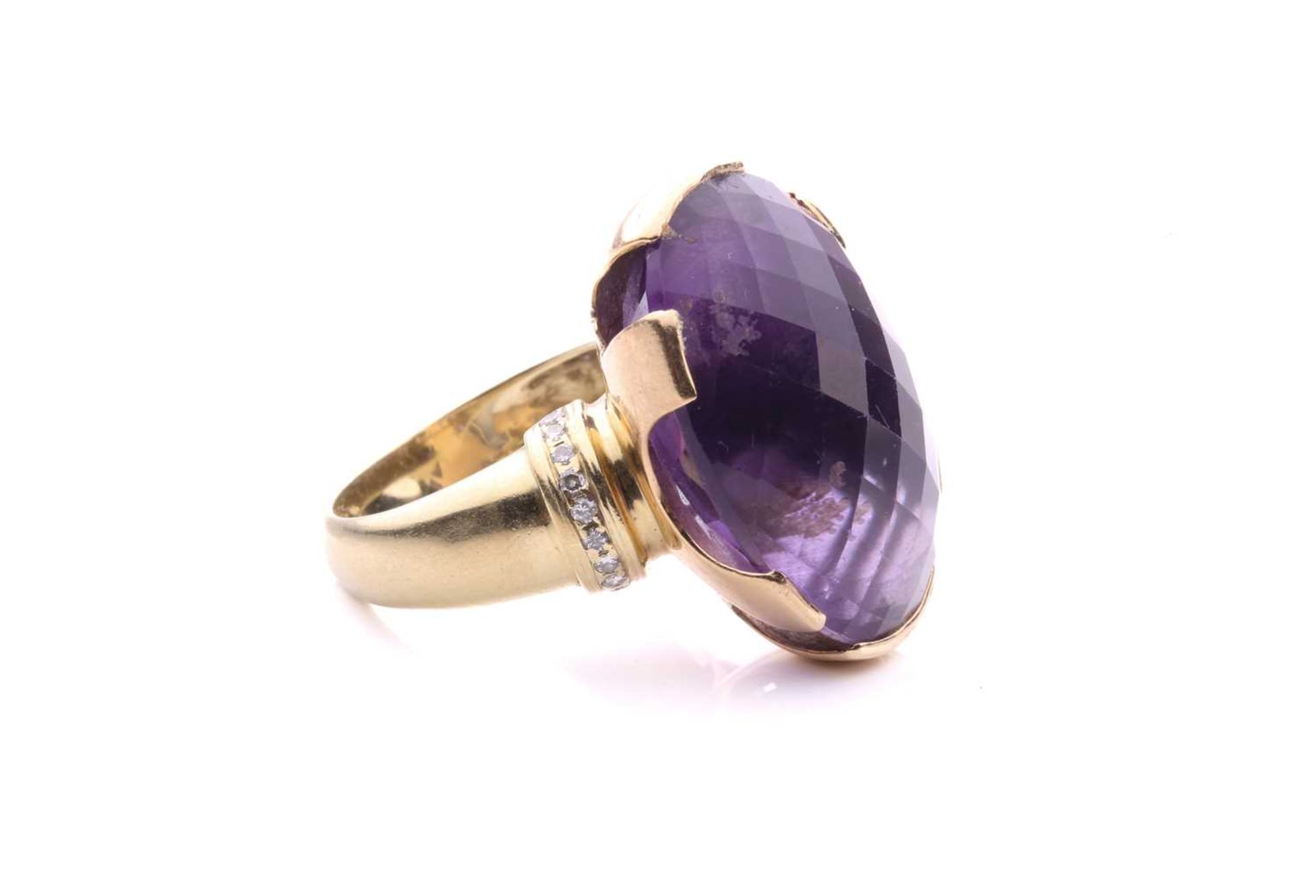 A large amethyst cocktail ring, set with an oval fancy cut amethyst of 25mm x 18mm x 14mm, each - Image 2 of 8