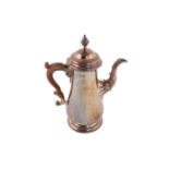 A George II silver coffee pot, London 1754, by Fuller White, of baluster form on a raised circular