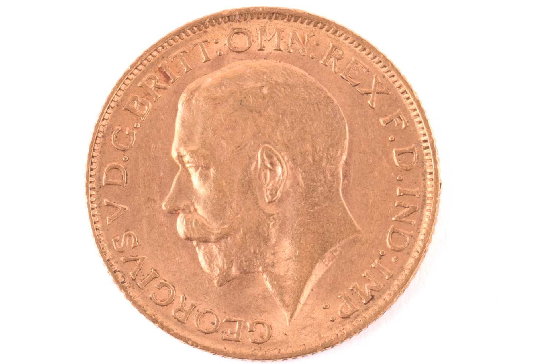 A George V full sovereign 1911, obverse with bare head facing left - Image 2 of 2