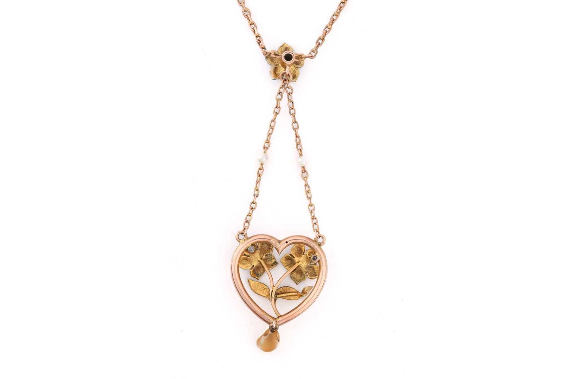 An Edwardian enamel and pearl floral pendant necklace designed as a heart with a spray of flowers in - Image 5 of 8