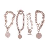 Three Tiffany & co. cable link bracelets with charm and another; including a Return to Tiffany