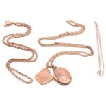 Two 9ct gold lockets on chain and two others; to include a square-shaped locket engraved with