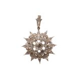 A Victorian style diamond star brooch/pendant, set with a central old cut diamond with an