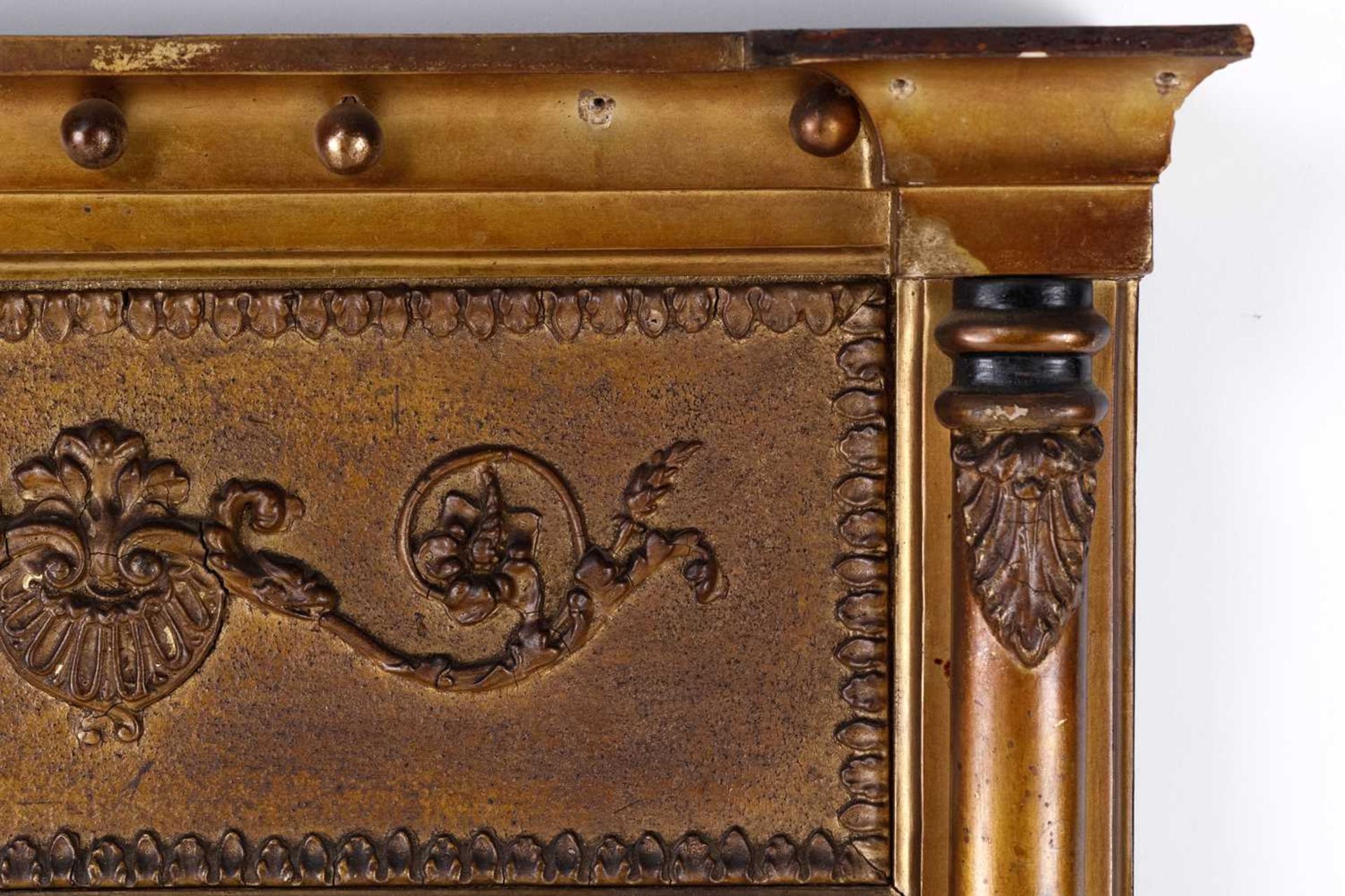 A Regency carved wood and gilt gesso pier glass, the inverted breakfront frame with sphere set - Image 4 of 9