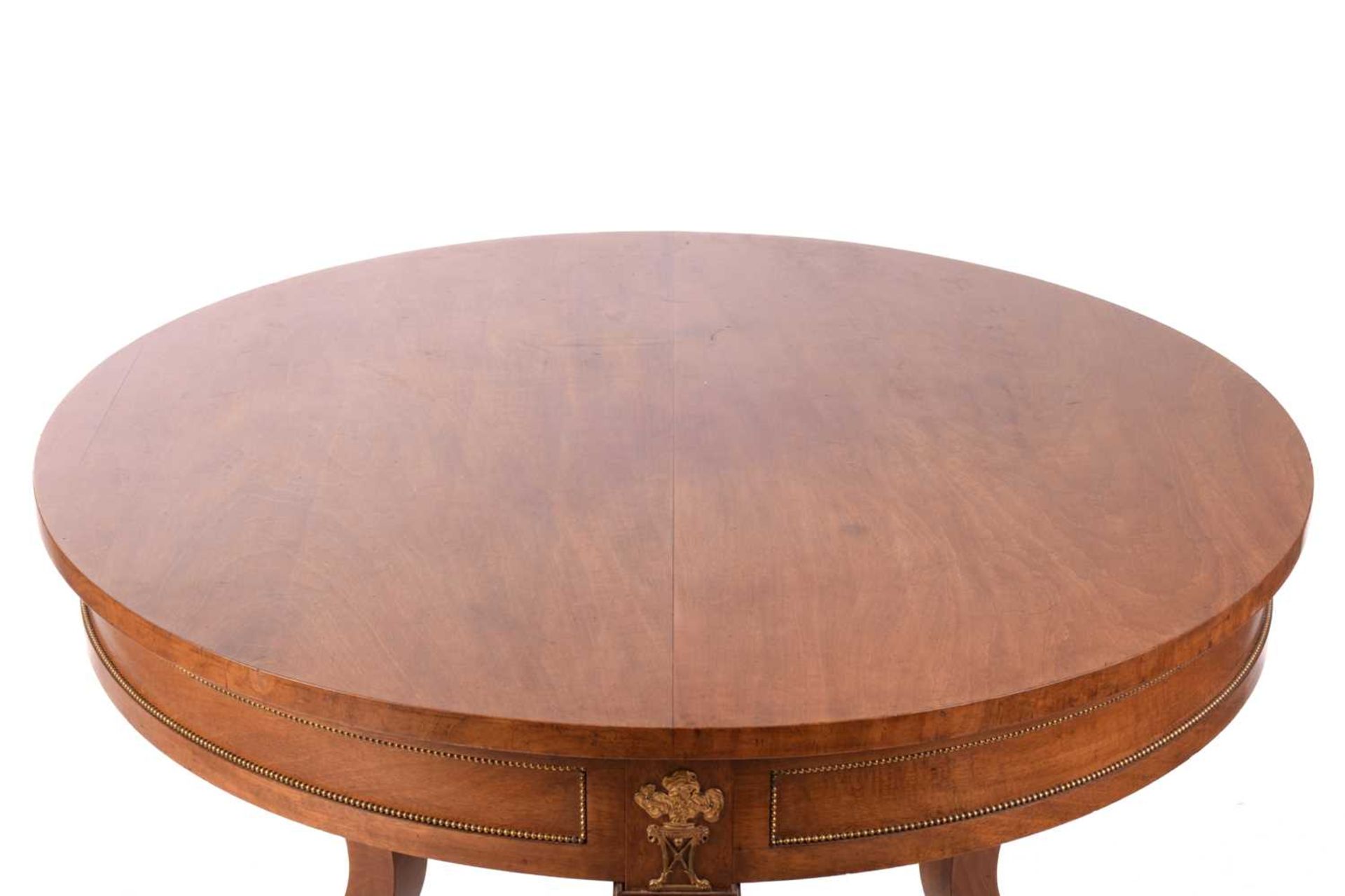 A French Empire Style centre table, the circular top over a gilt beaded panelled frieze and - Image 4 of 6