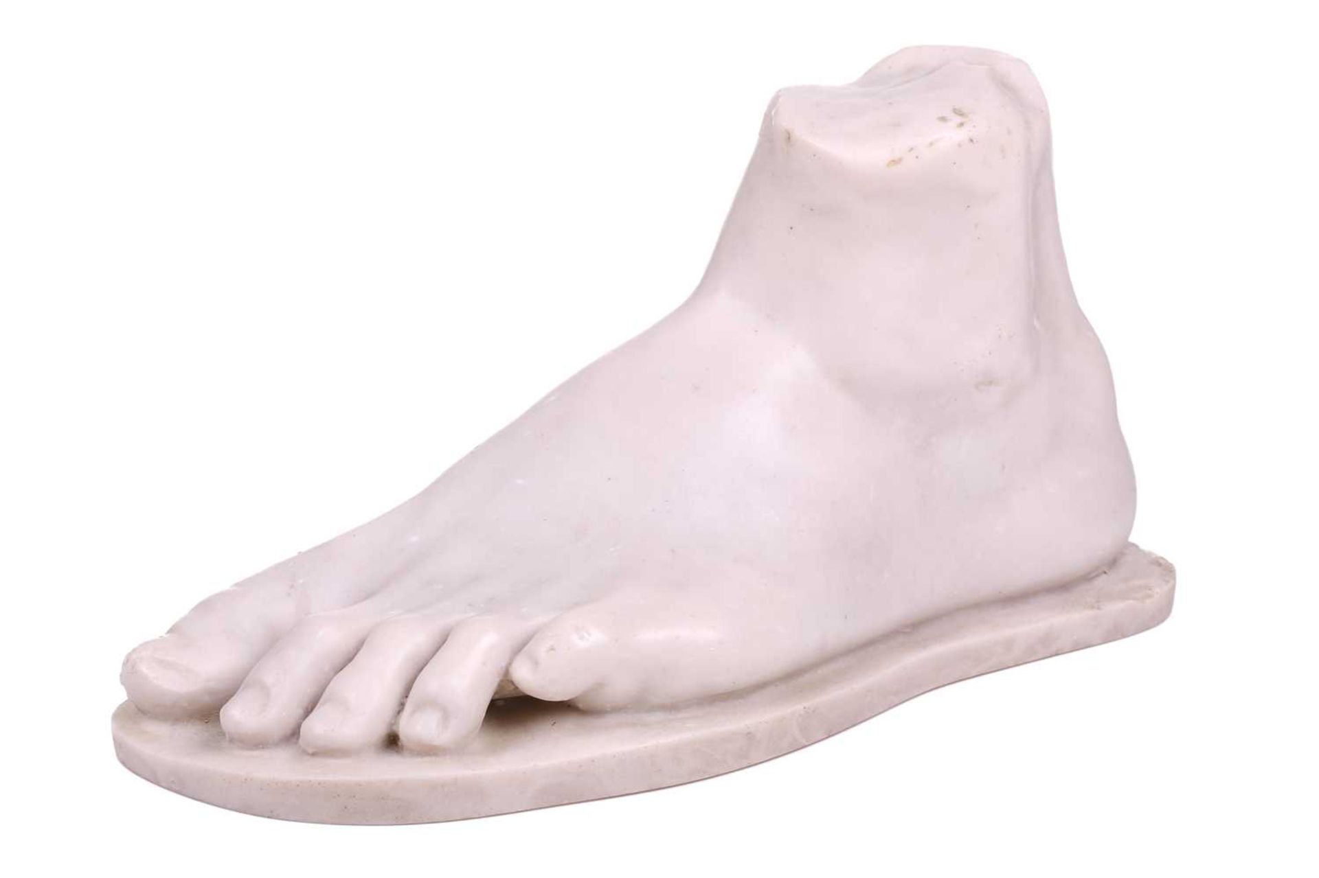 A composite stone grand tour-style sculpture of a foot after the antique. 32 cm long x 12 cm wide