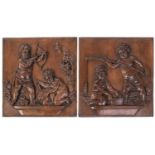 A pair of decorative 19th-century carved walnut square panels, each with figures of amorini