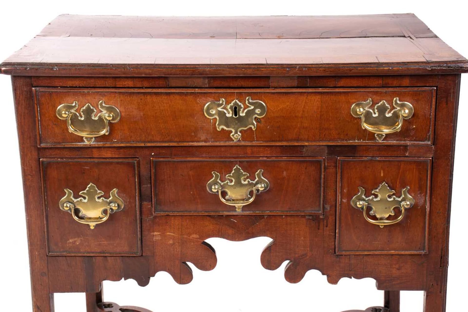 A George III mahogany kneehole lowboy with cross and feather banded top above a single frieze drawer - Image 3 of 6