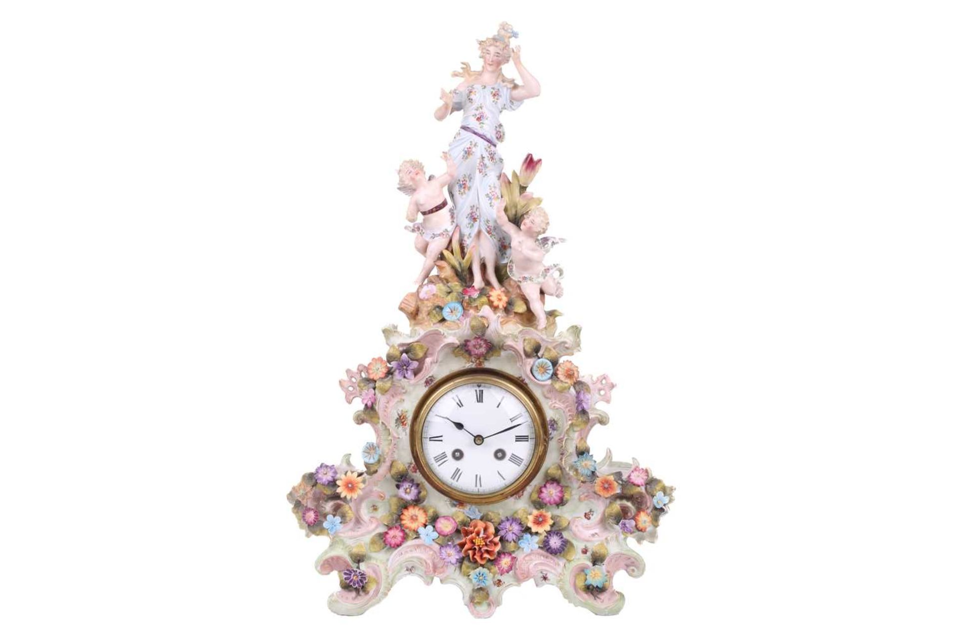 A late 19th-century German Porcelain figural 8-day mantel clock with cherubic and muse surmount