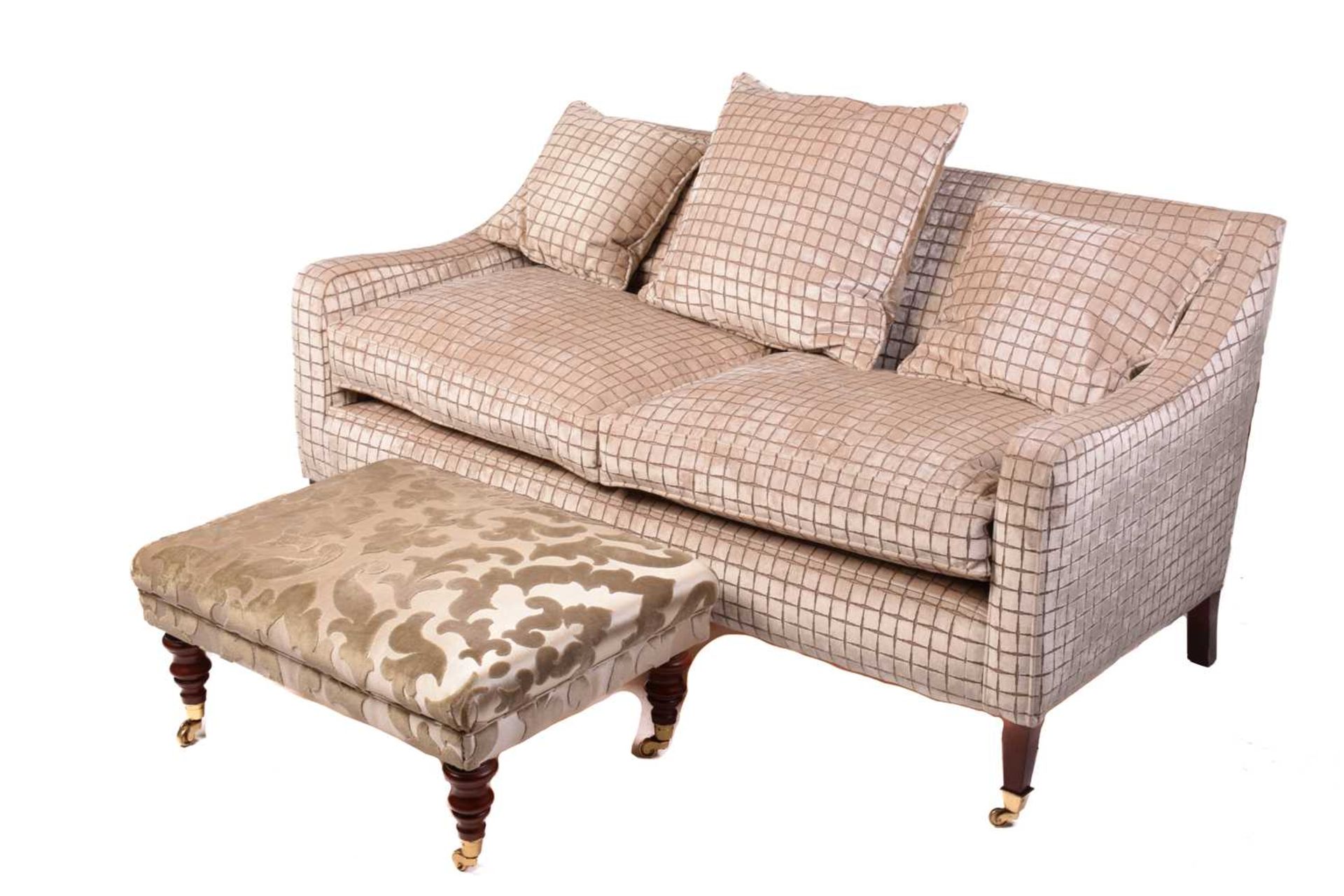 A Regency style settee, 20th century, well upholstered in a square grid pattern material, on