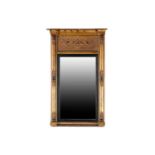 A Regency carved wood and gilt gesso pier glass, the inverted breakfront frame with sphere set